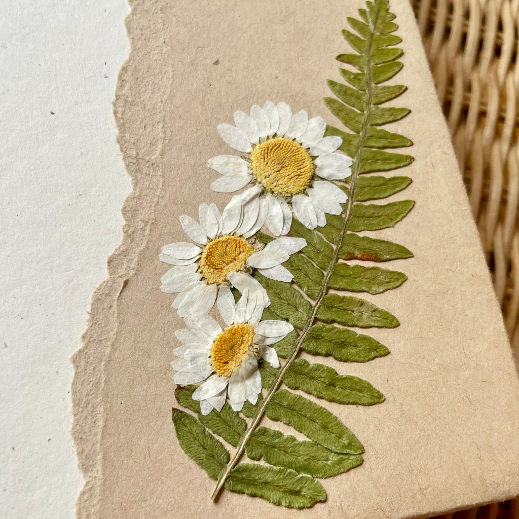 handmade bullet journal with pressed flowers