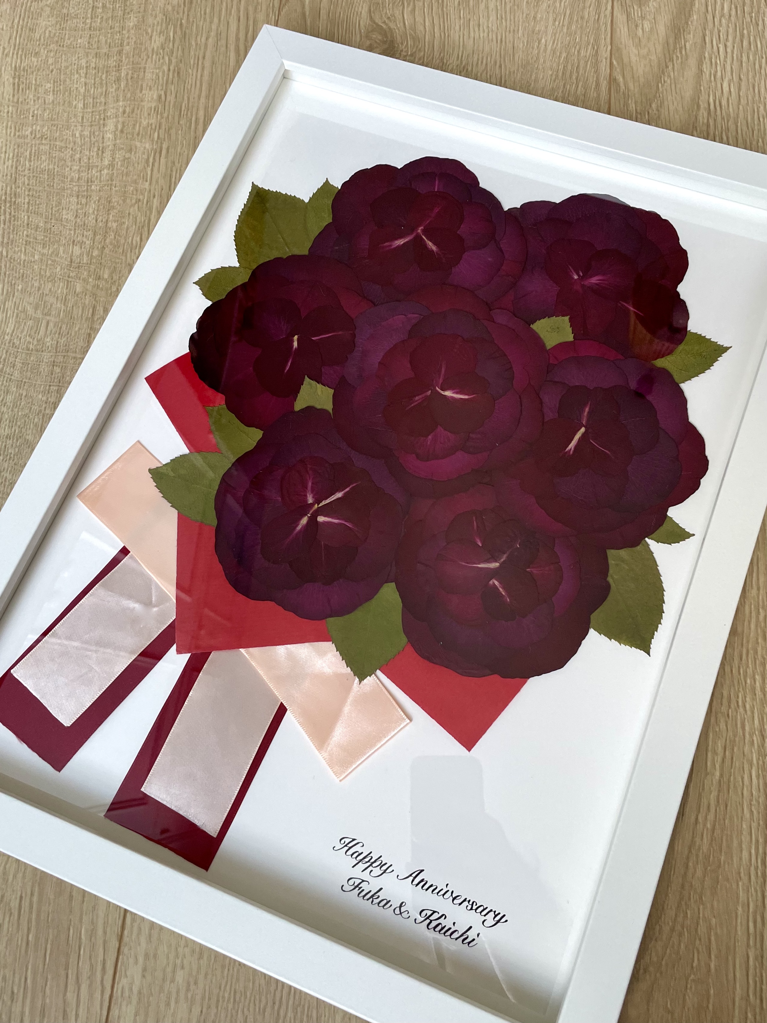 Conservation bouquet de mariage roses rouges pressées